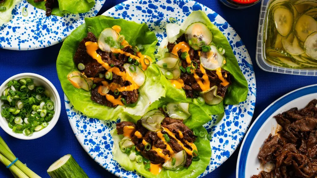 Beef lettuce wraps on a plate with all the fixings