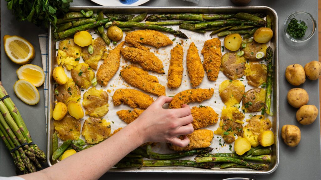 sheet pan chicken and potatoes with roasted vegetables.