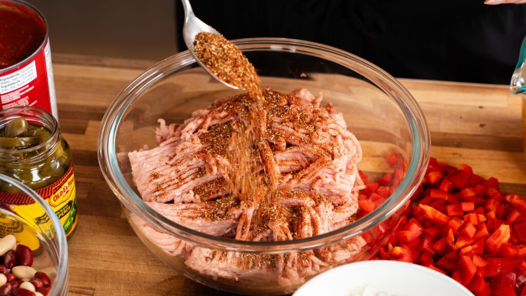 Spinning up a bowl of ground turkey to make the Goop turkey chili recipe.