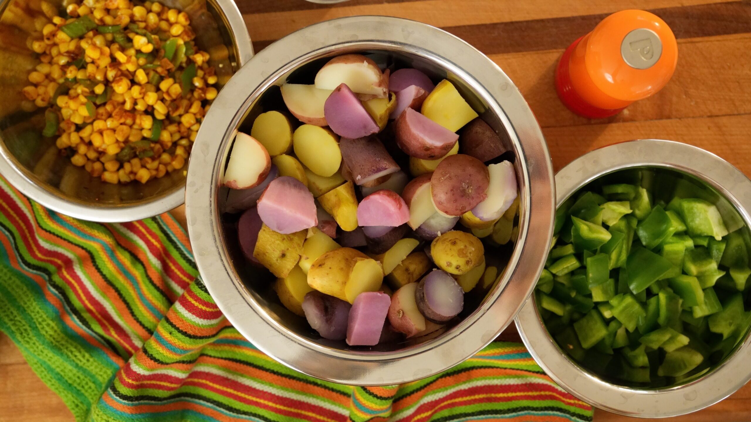 Ingredients on a counter for this corn salad with potato and jalape&ntilde;o.