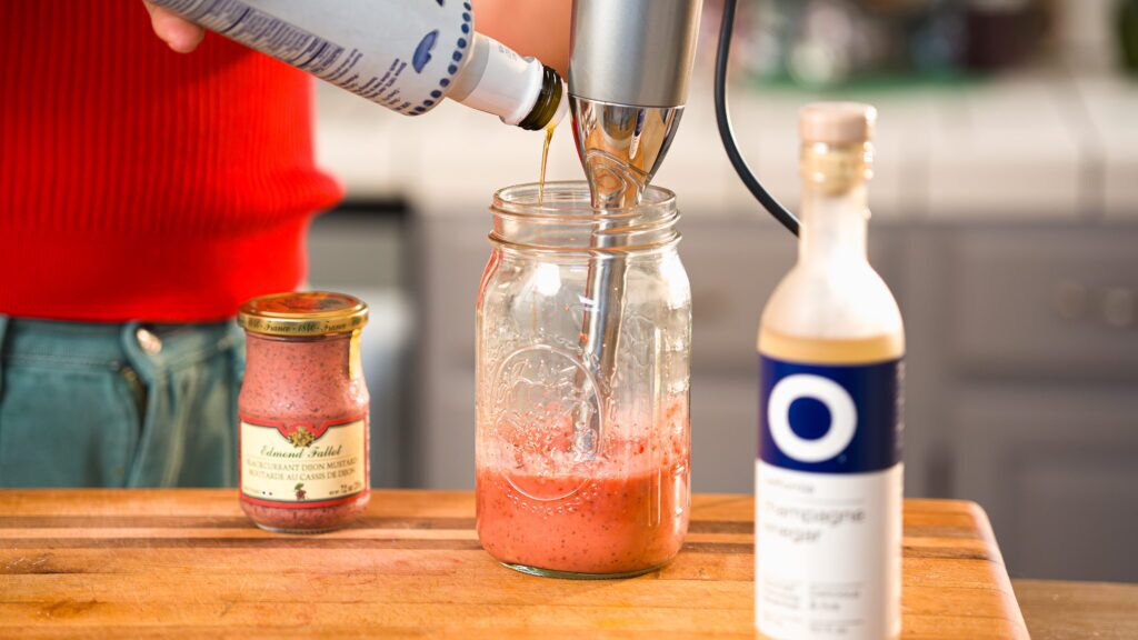Emulsifying this strawberry salad dressing in a mason jar.