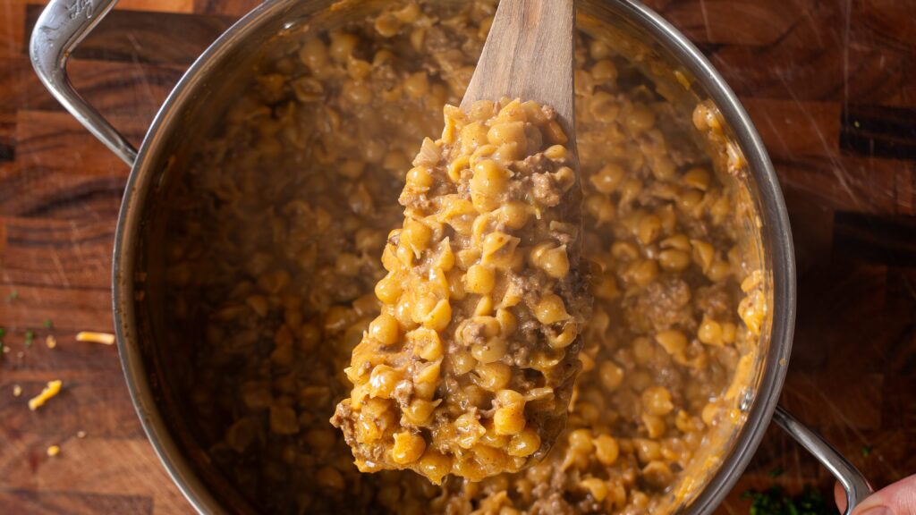 Homemade hamburger helper being made in a large pot.