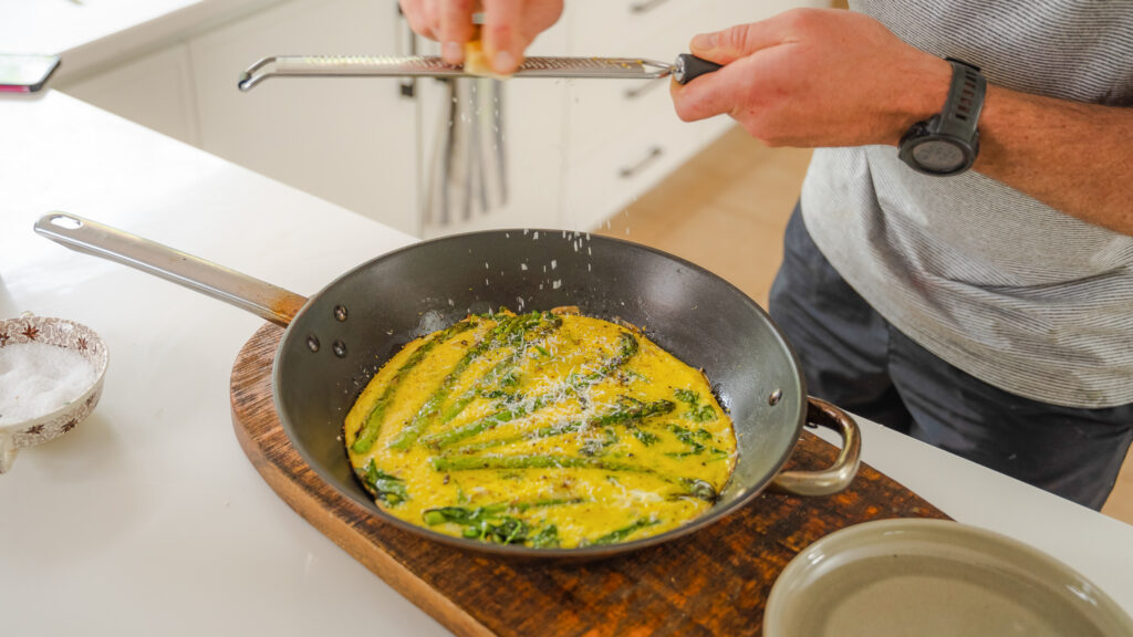 Shredding Cheese on Frittata 