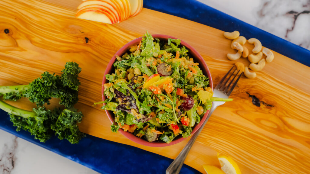 Crunchy Curry Chop Salad in a red bowl.