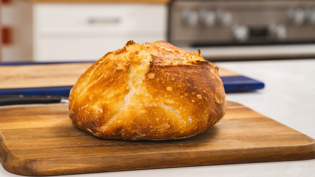 No Knead Market Style Bread on Cutting board