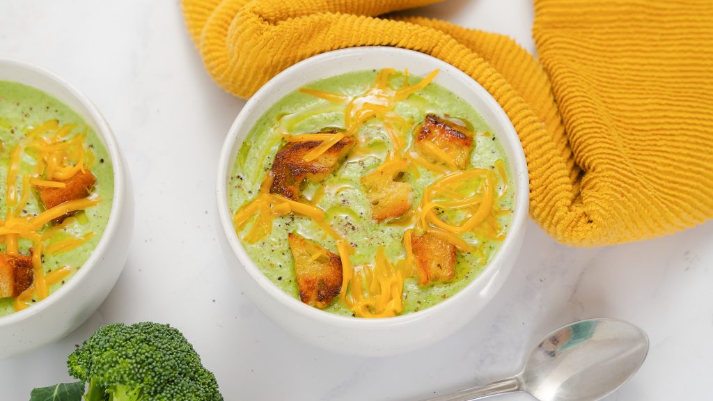 A close up shot of Broccoli Cheddar soup