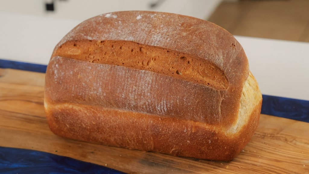 A close up shot of a whole loaf of protein bread.