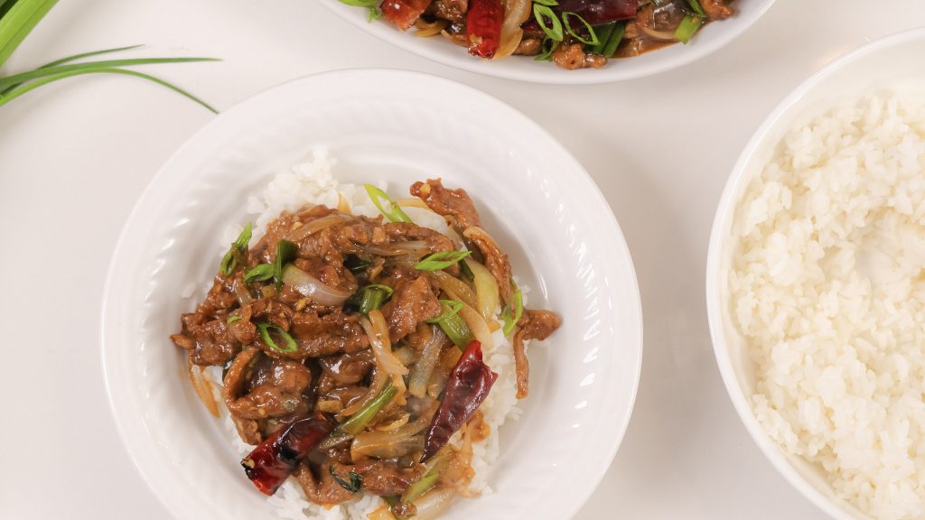 Mongolian Beef in a white bowl.