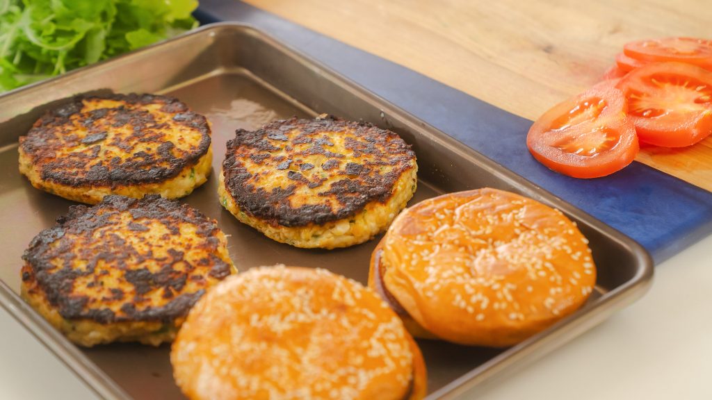 Chickpea Burgers being cooled after frying in the pan. 