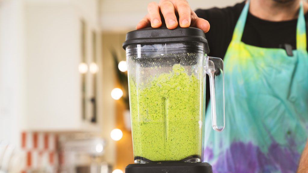 A close up shot of Shkug being blended in a blender. 