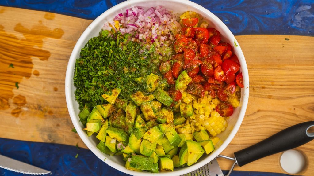 overhead shot of salad ingredients in a bowl