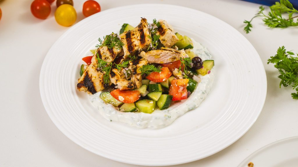 grilled chicken on greek salad