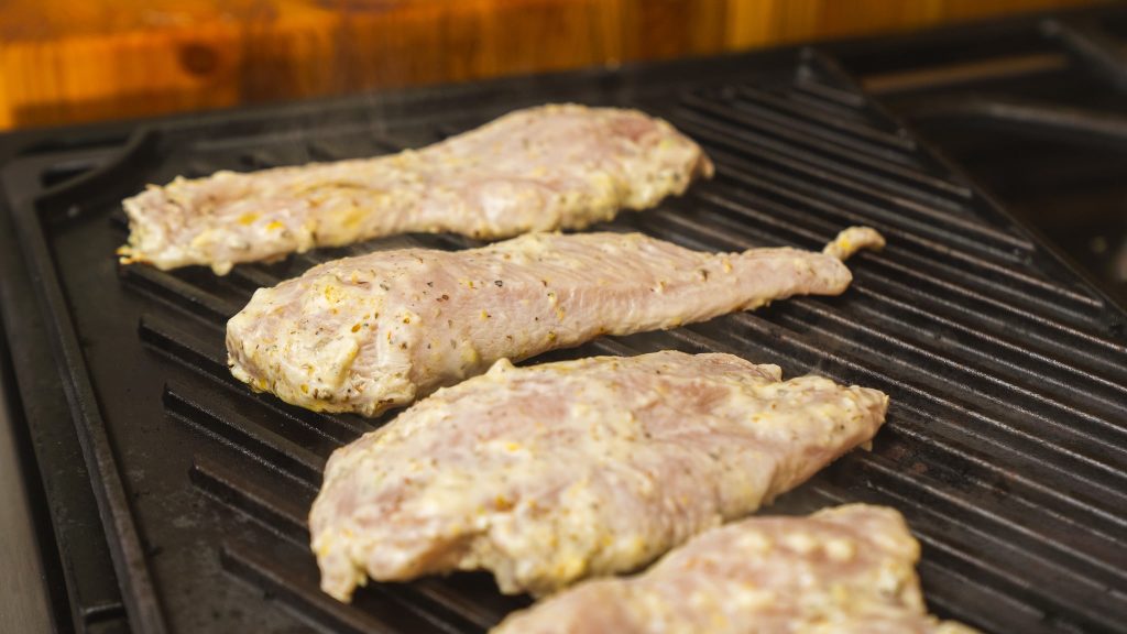 chicken grilling on grill