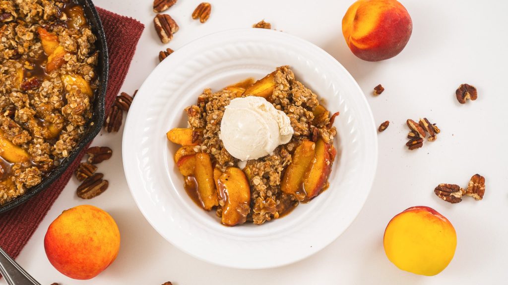 ice cream on top of peach crisp