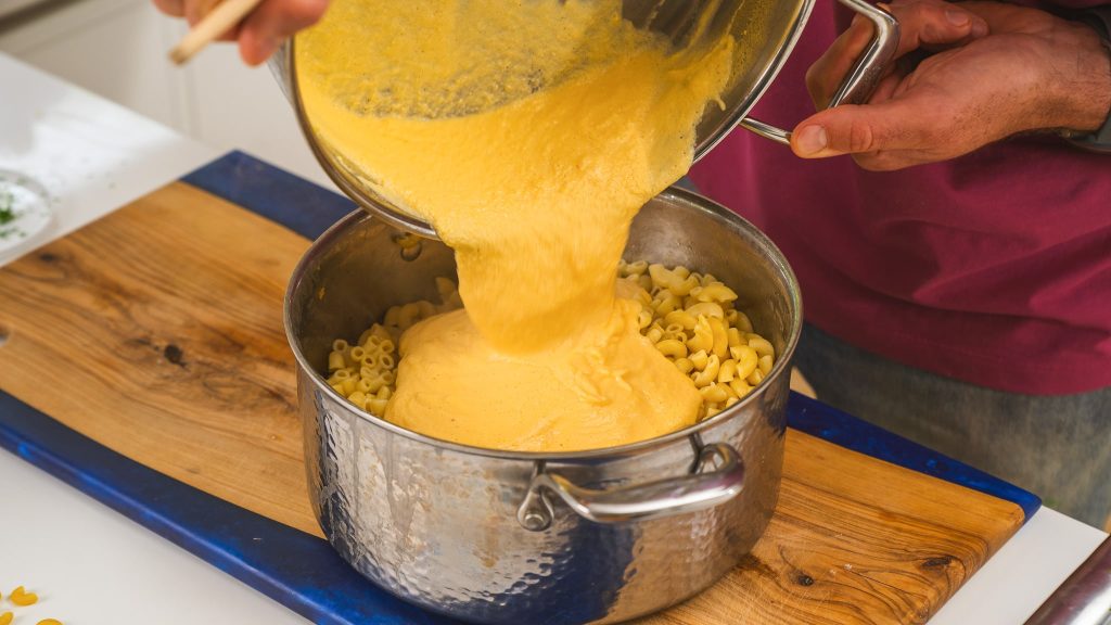 cheese sauce being poured