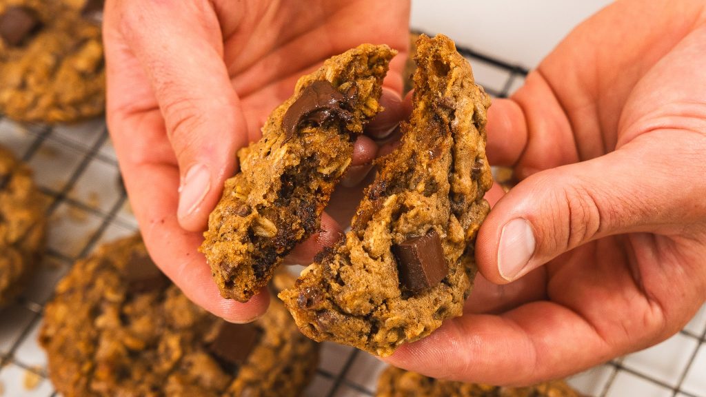 splitting open chocolate cookies