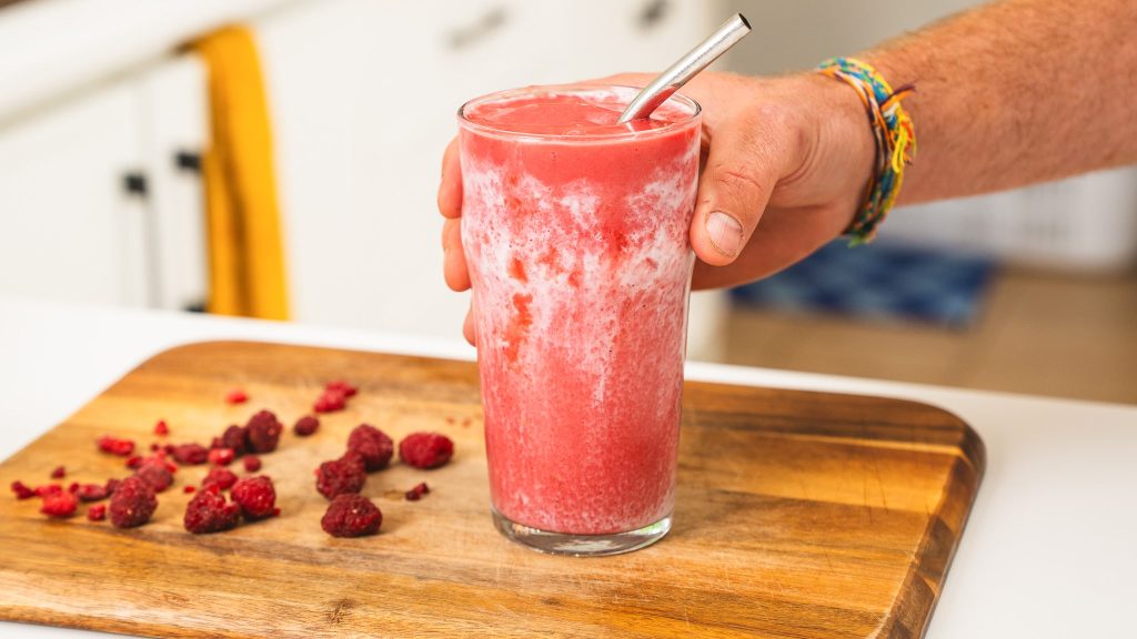 hand reaching for hailey bieber smoothie