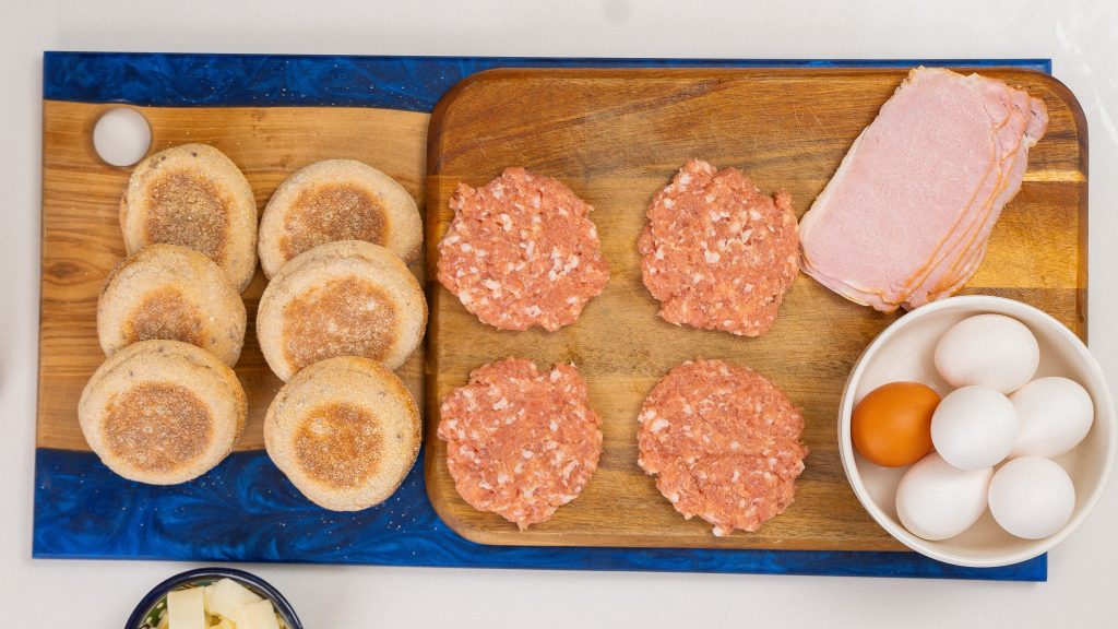 top down of raw breakfast sandwich ingredients