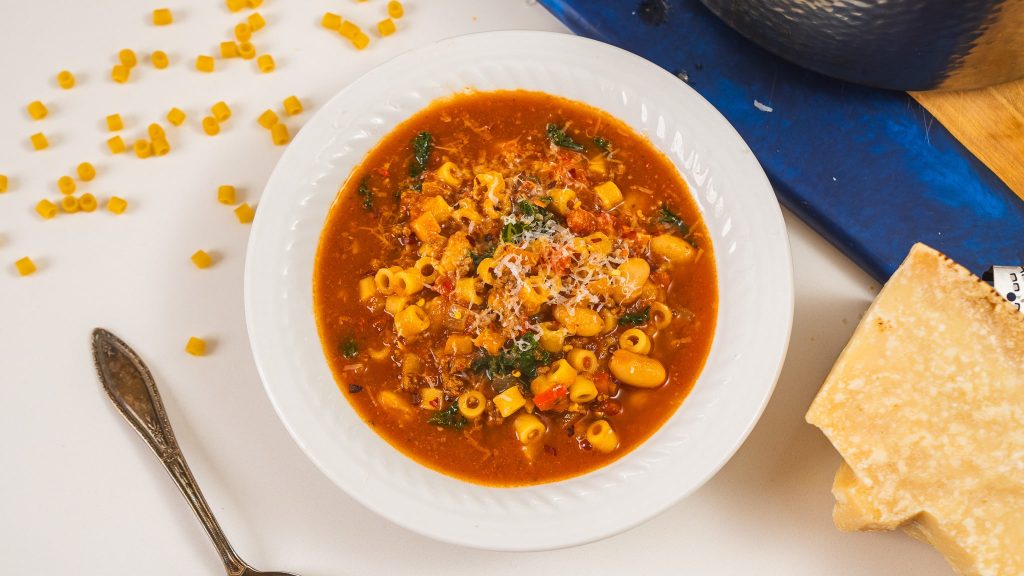 Top down view of soup in white bowl