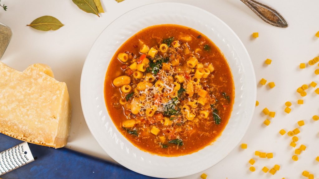 Top down view of Pasta Fagioli in white soup bowl