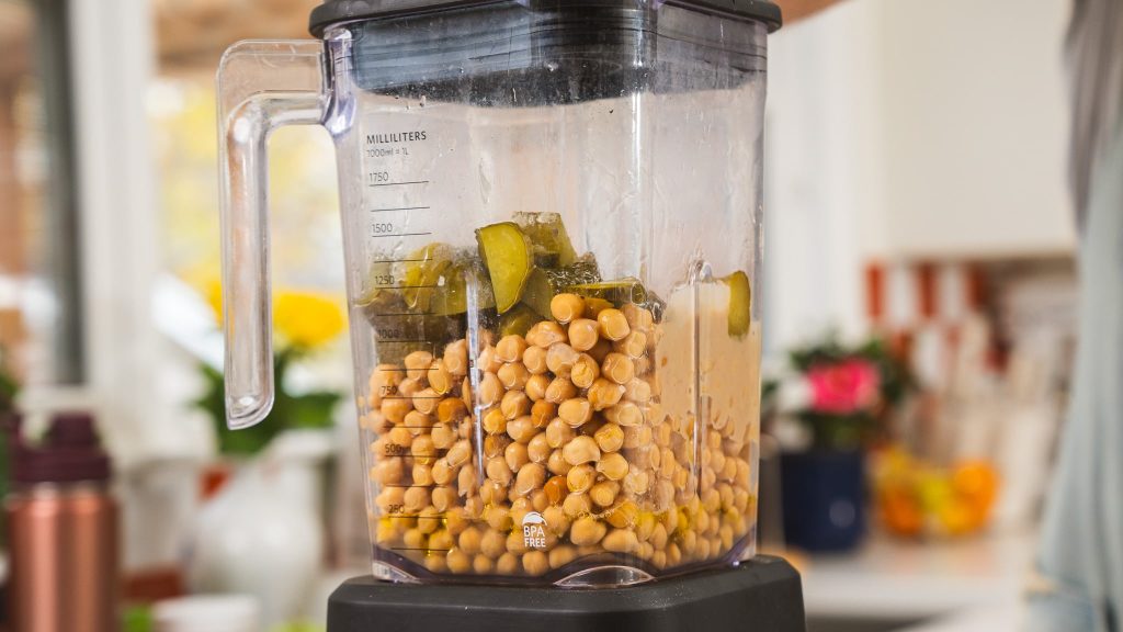 blend bowl filled with chickpeas, pickles, and ingredients