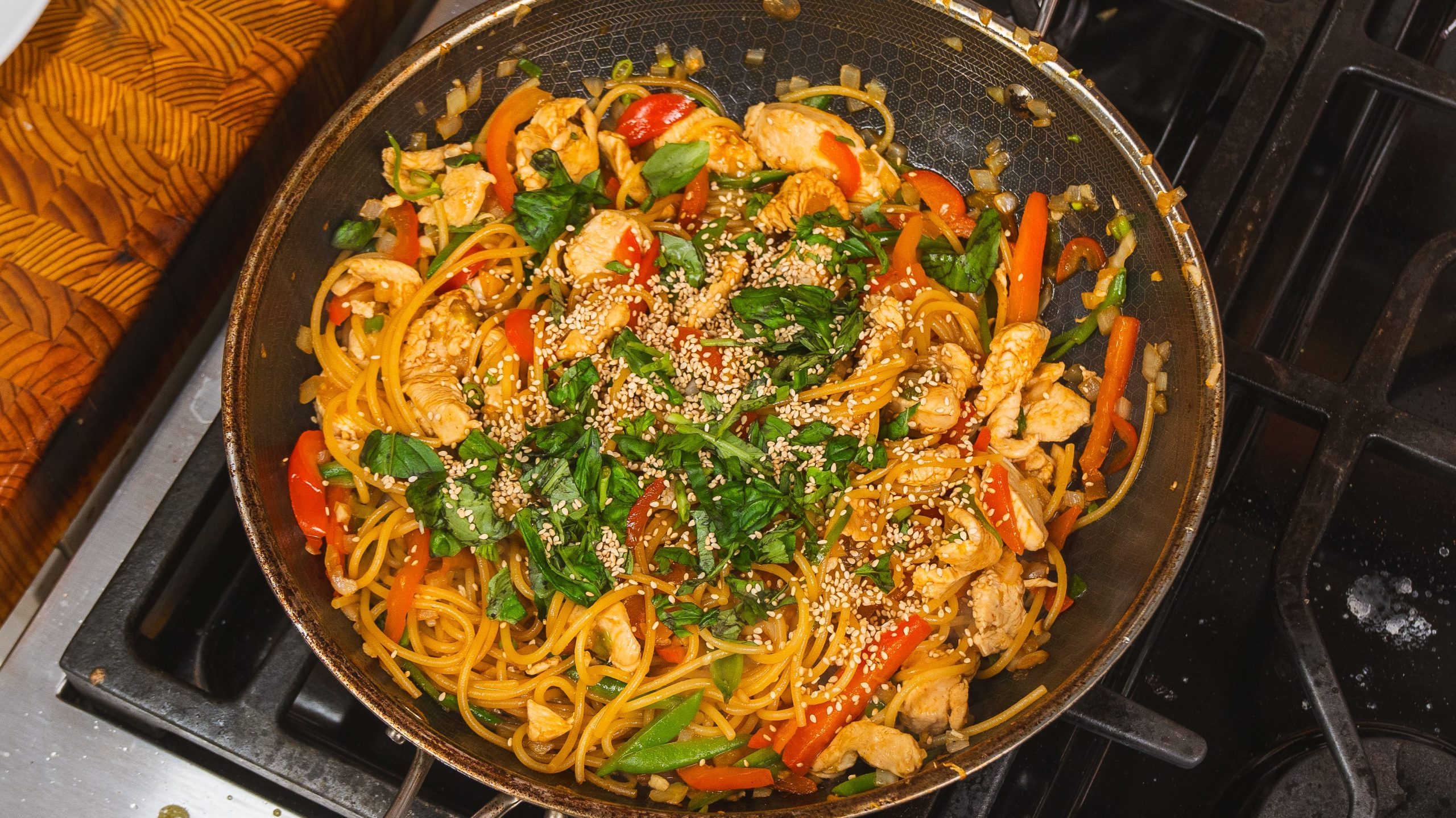 a one pan chicken noodle stir fry recipe featuring fresh veggies.