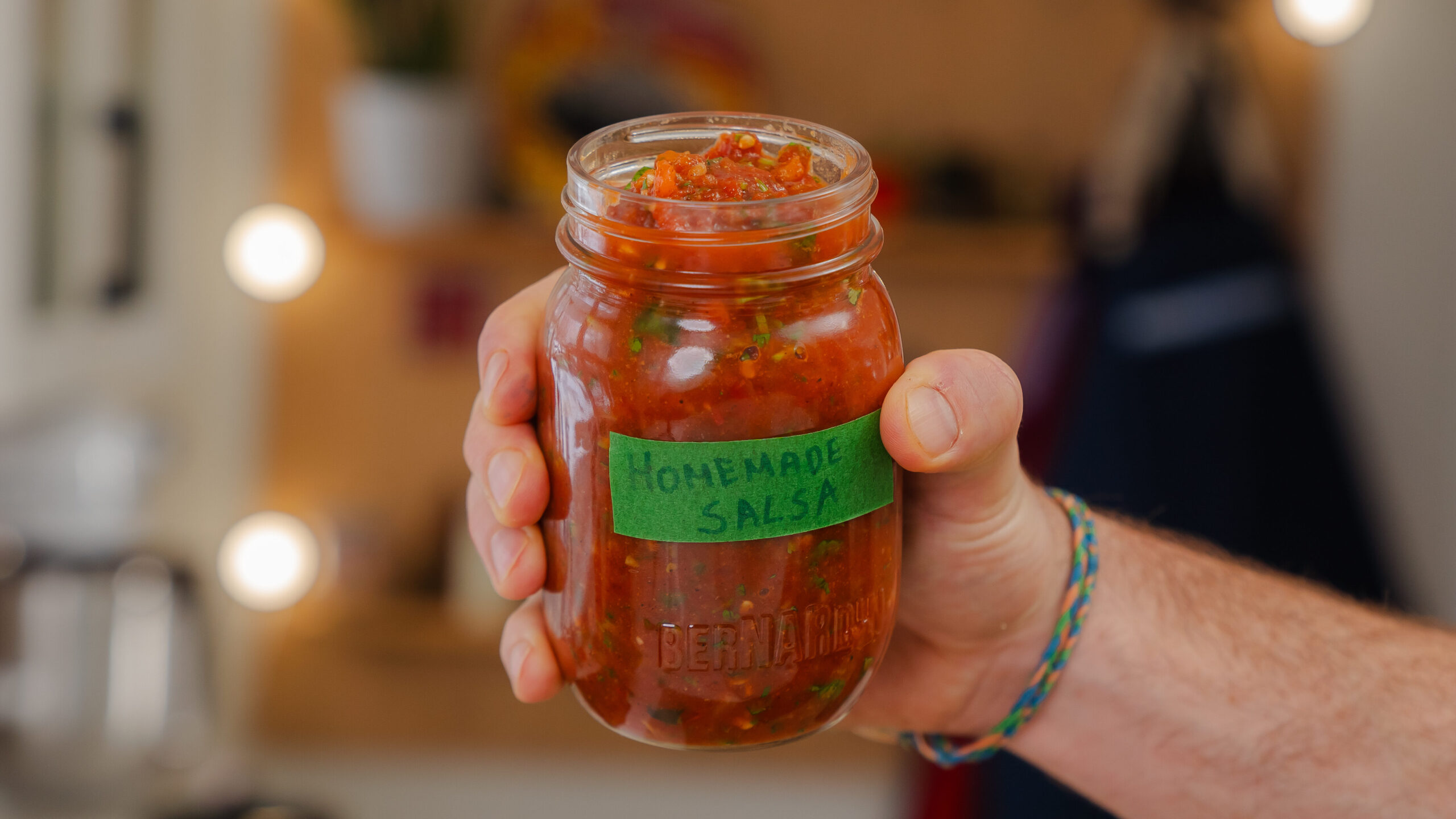 Homemade salsa in a mason jar.